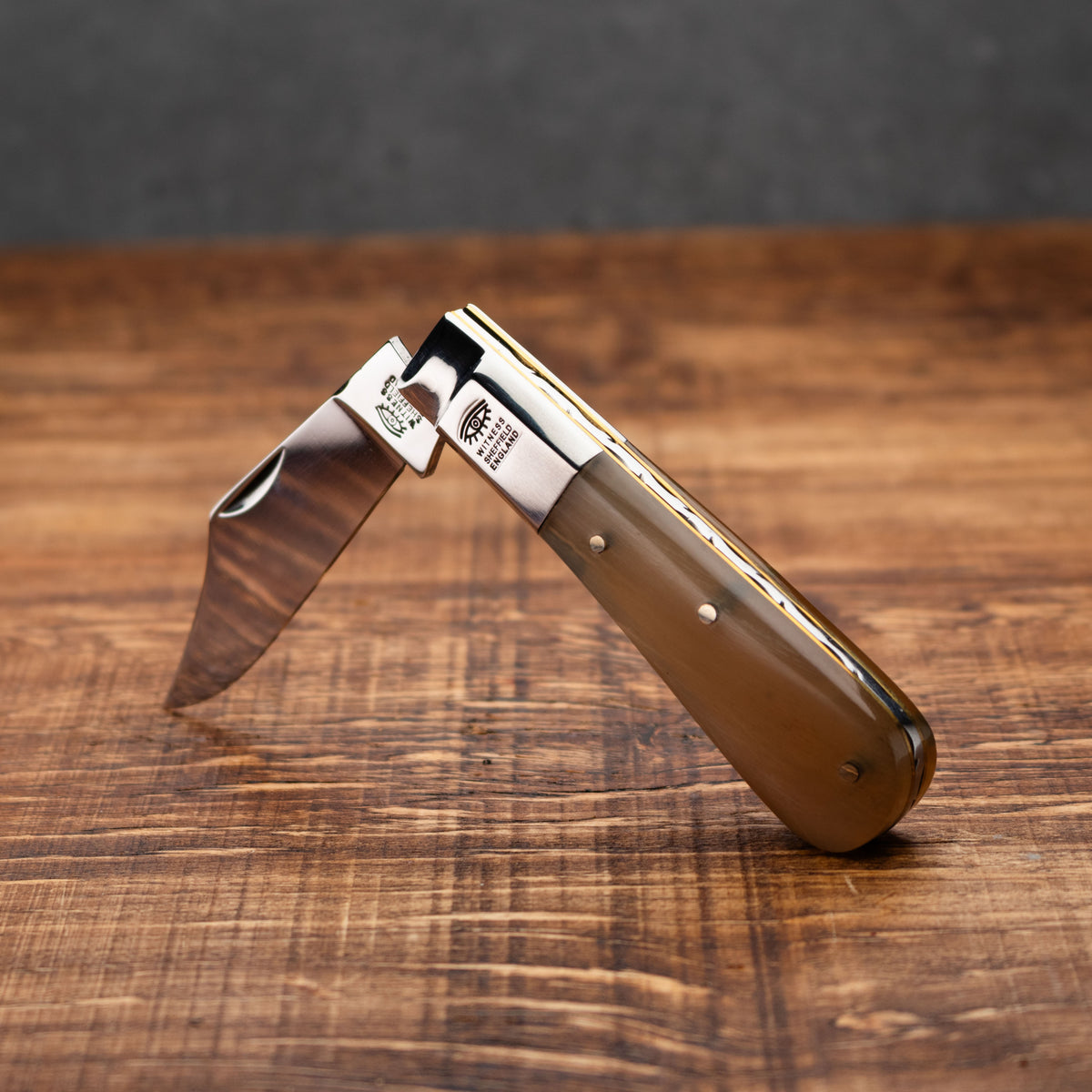 Taylors Eye Witness Premier Collection - Single Blade Ramshorn Worked Back
