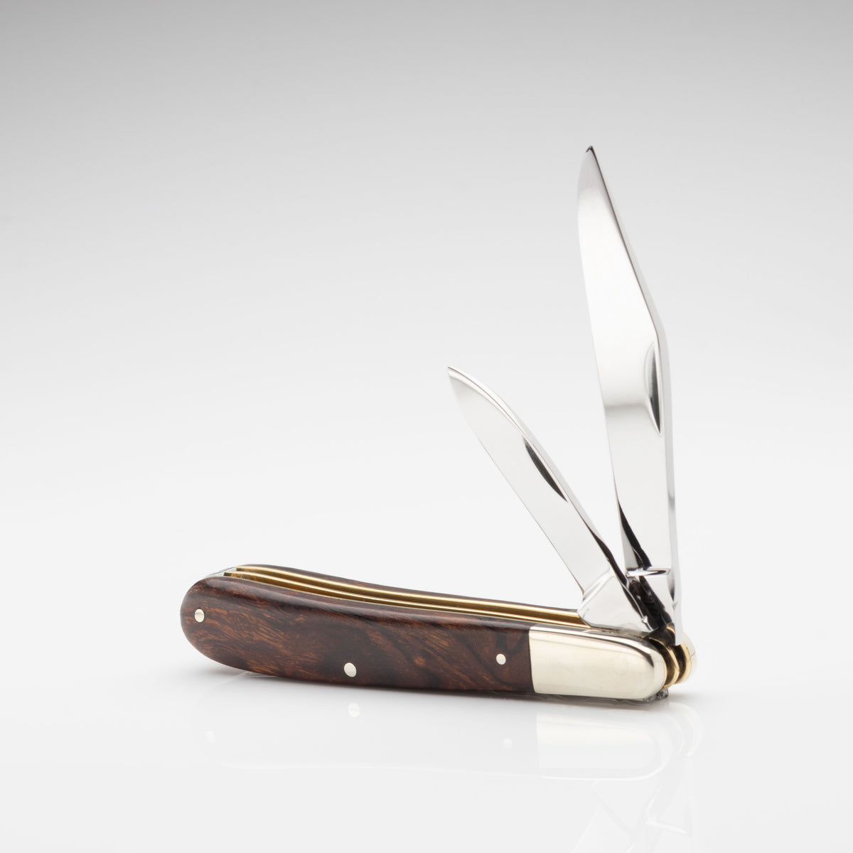 Premier Collection Twin Gentleman's Clip Point Blade with Desert Ironwood Scales Worked Back