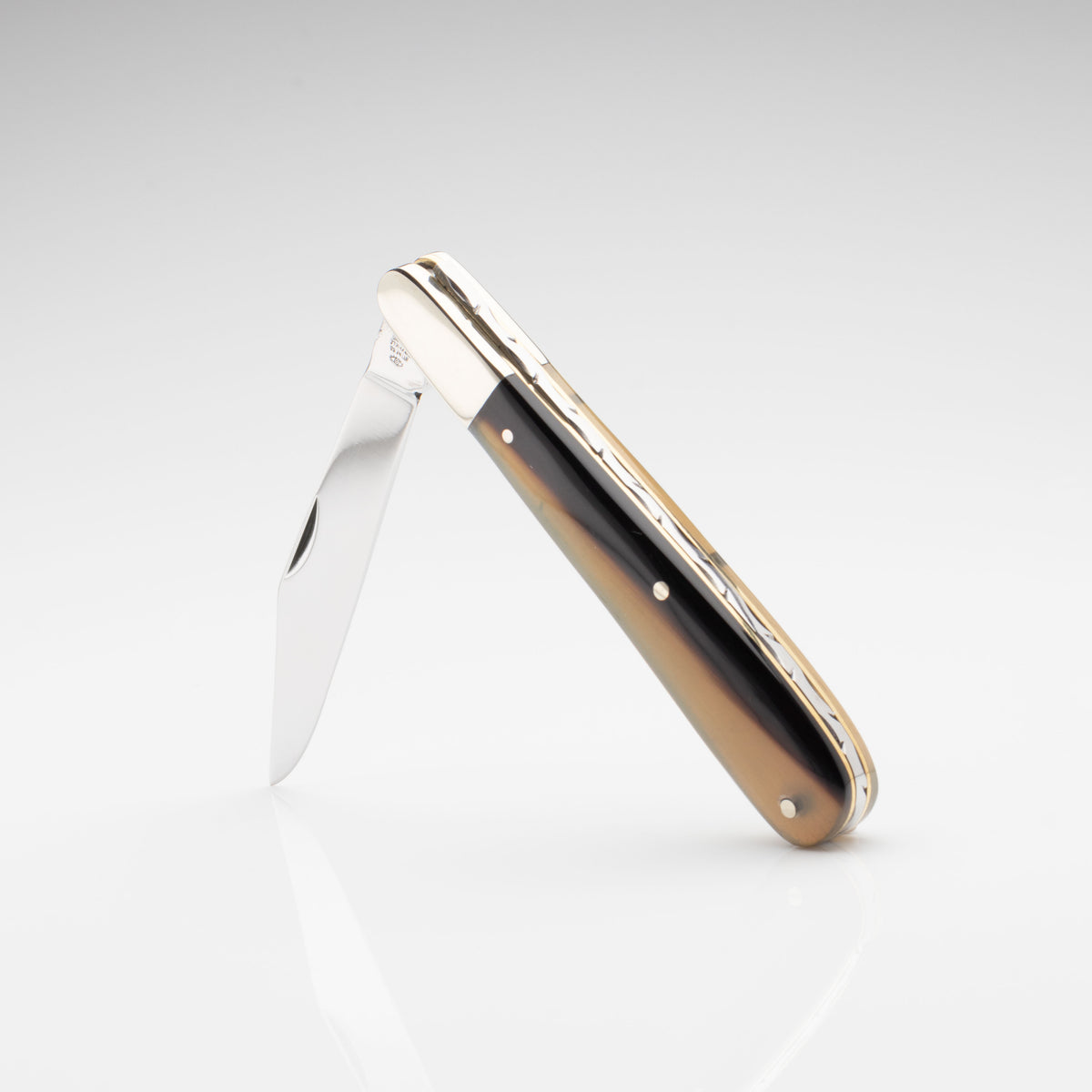 Premier Collection - Single Blade Gentlemans Clip Point Ox Horn with Worked Back Scales