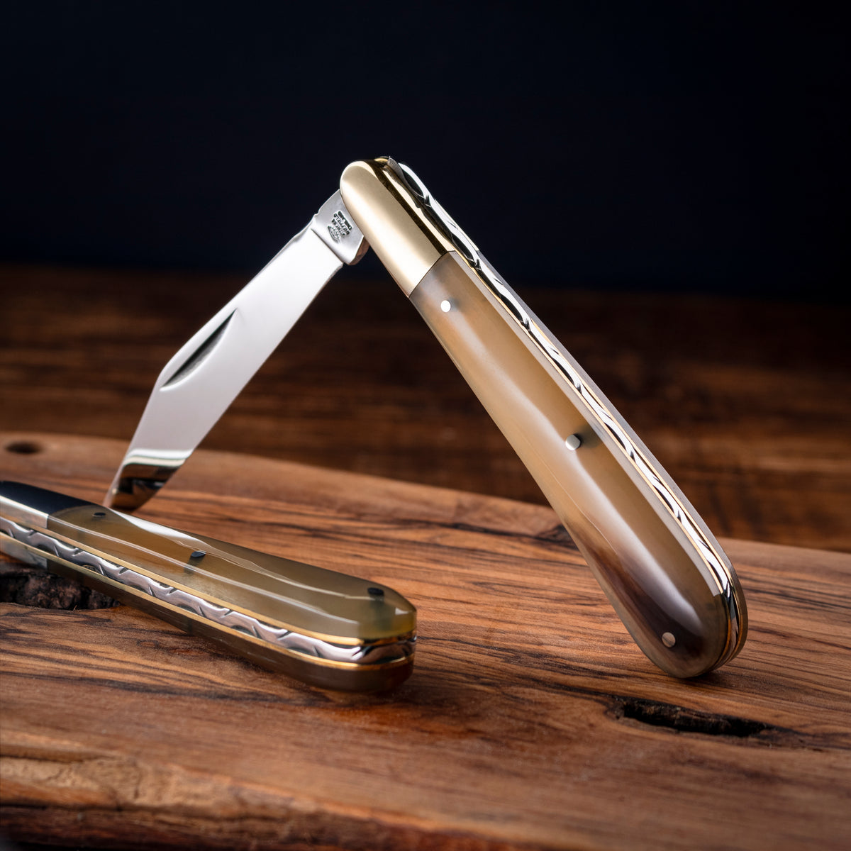 Premier Collection - Single Blade Gentlemans Clip Point Ox Horn with Worked Back Scales