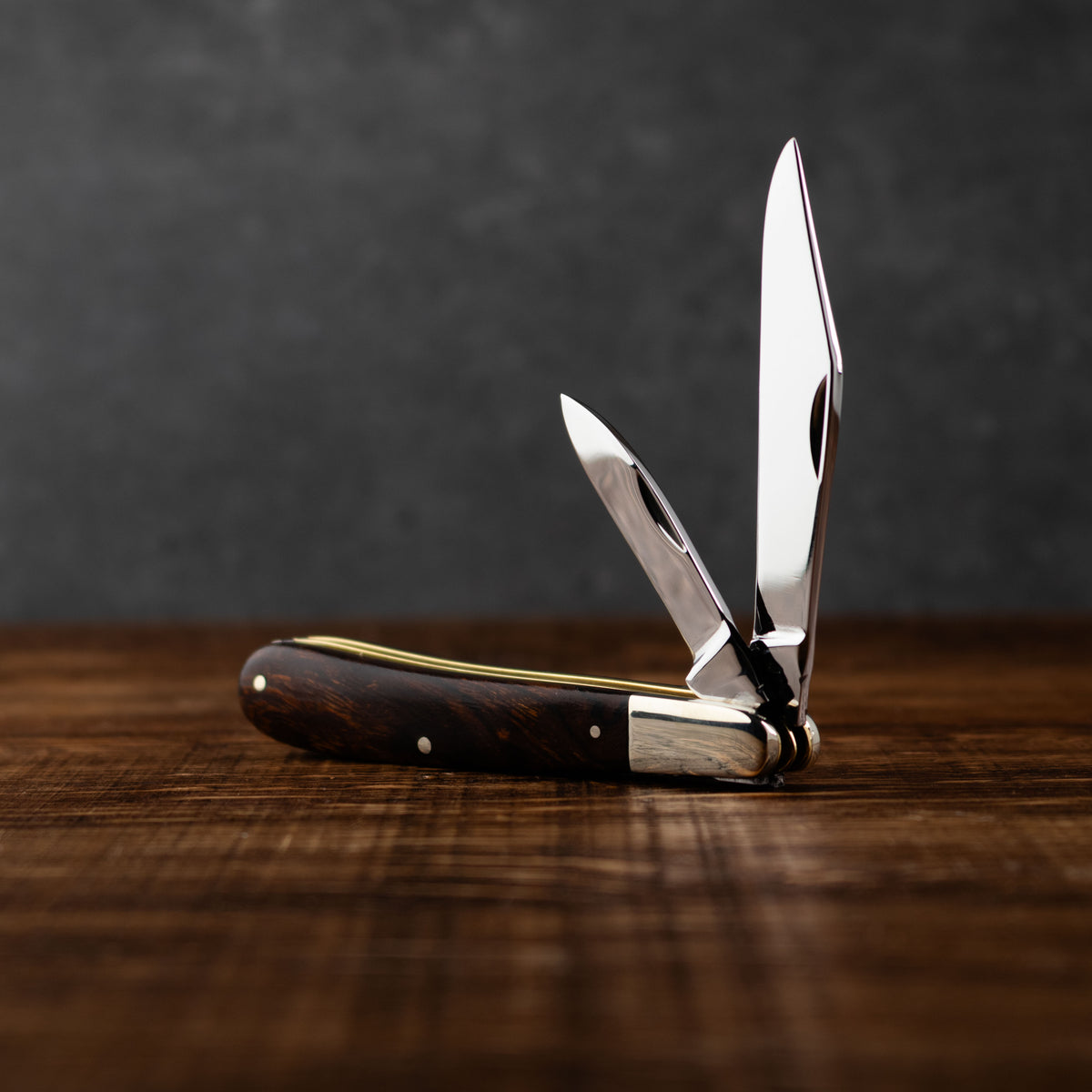 Premier Collection Twin Gentleman's Clip Point Blade with Desert Ironwood Scales Worked Back